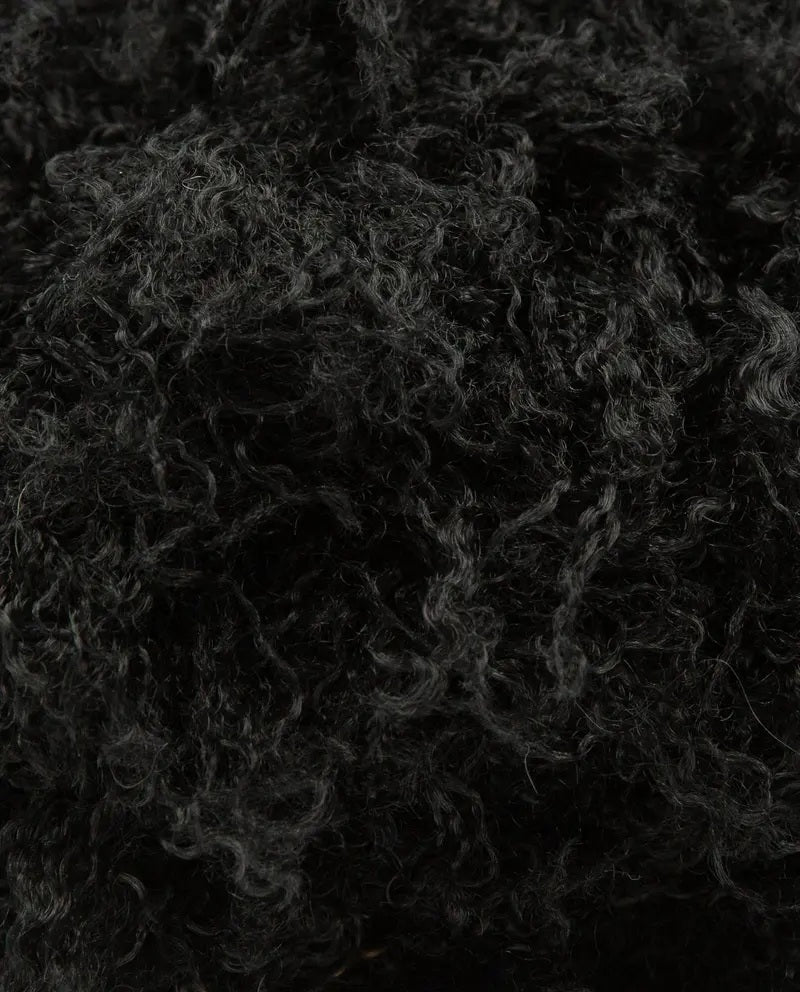 Detailansicht der Farbe Schwarz von Phil Sibéria mit weichem, lockigem Flor