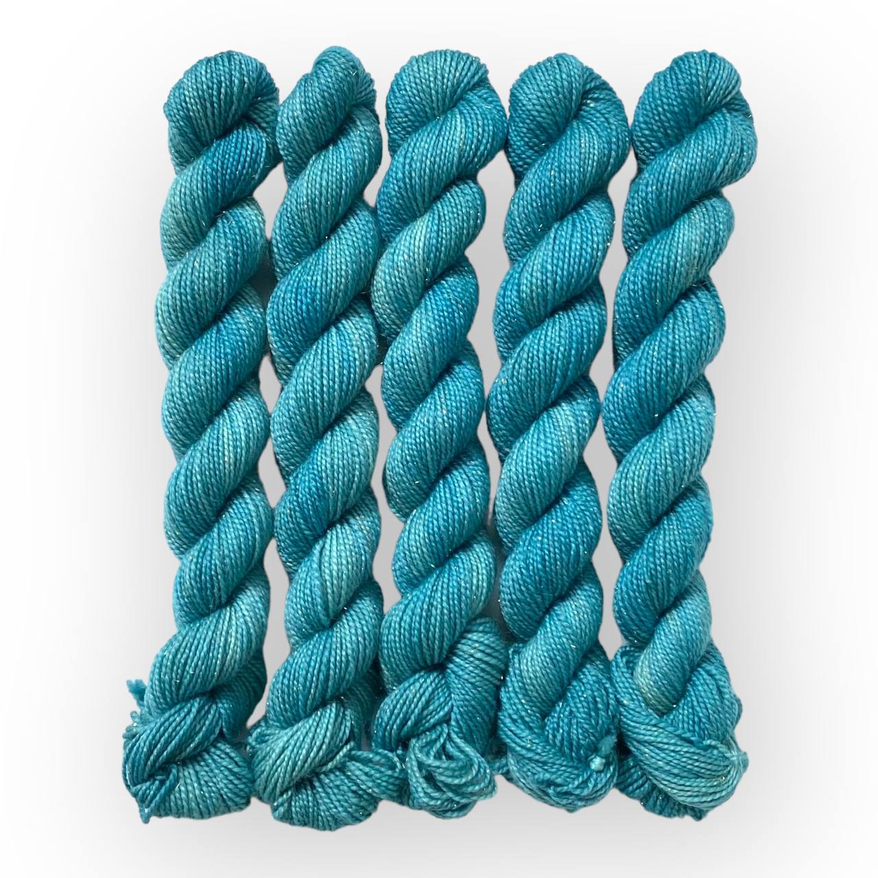 opal wolle kaufen	Sapphire Springs	Mini Glitzer Gold - handgefärbte Sockenwolle