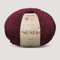 Sesia Neve Bouclé aus 100 % RWS-Merinowolle in Bordeaux – luxuriöses Bouclégarn mit natürlichem Volumen und weichem Griff