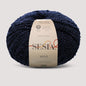 Sesia Neve Bouclé aus 100 % RWS-Merinowolle in Dunkelblau – hochwertiges Bouclégarn für elegante Strickjacken und Winterpullover