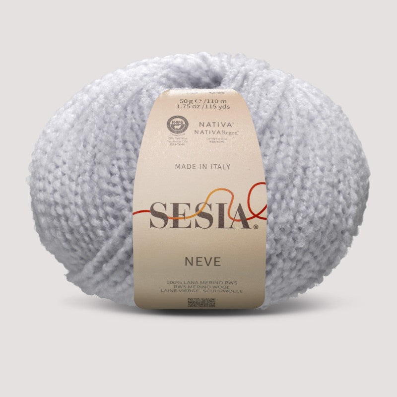 Sesia Neve Bouclé aus 100 % RWS-Merinowolle in Eisblau – leichtes Bouclégarn mit weicher Struktur für stilvolle Strickideen