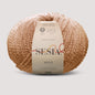 Sesia Neve Bouclé aus 100 % RWS-Merinowolle in warmem Beige – hochwertiges Bouclégarn für zeitlose Pullover und Cardigans