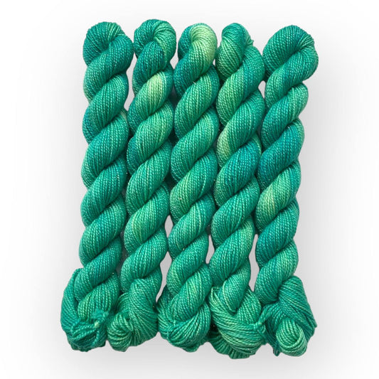 sockenwolle kaufen	Minty Spring Burst	Mini Glitzer Gold - handgefärbte Sockenwolle