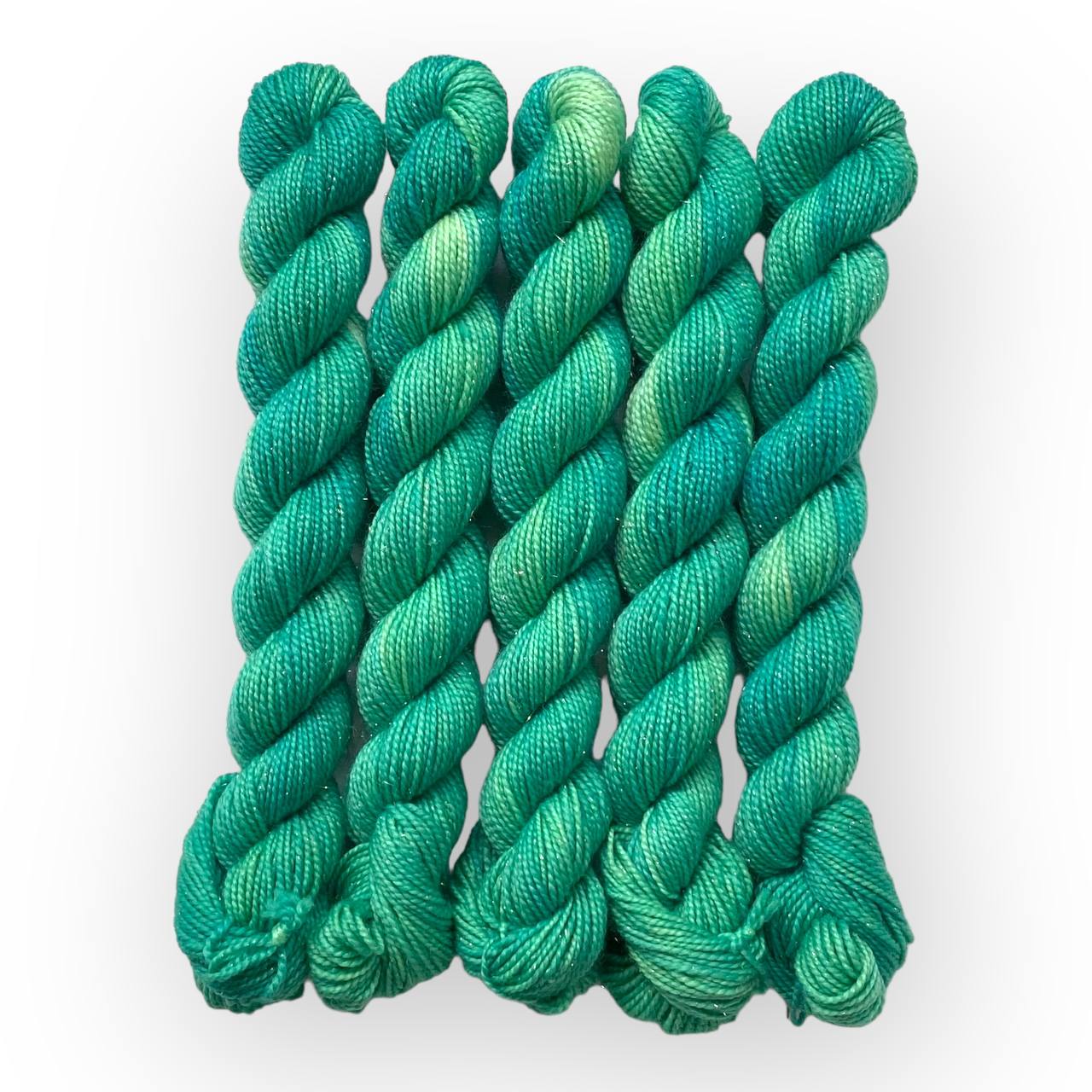 sockenwolle kaufen	Minty Spring Burst	Mini Glitzer Gold - handgefärbte Sockenwolle